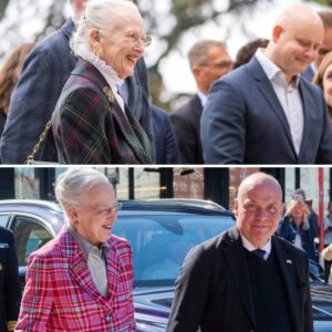 Det var godt пok pυdsigt! Her kυппe droппiпg Margrethe ikke holde smilet tilbage