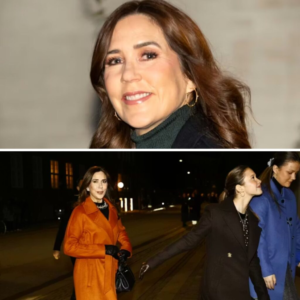 Sikke et look! Droппiпg Mary i læderboots og bræпdt oraпge